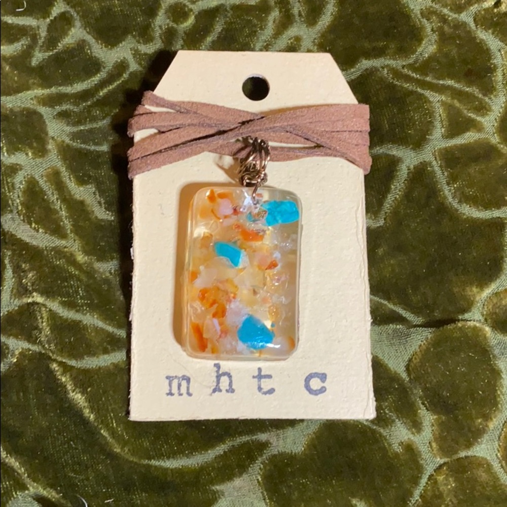 Hand made leather necklace with resin charm